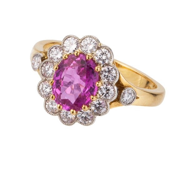 Oval sapphire and brilliant cut diamond cluster ring (OUT OF STOCK)