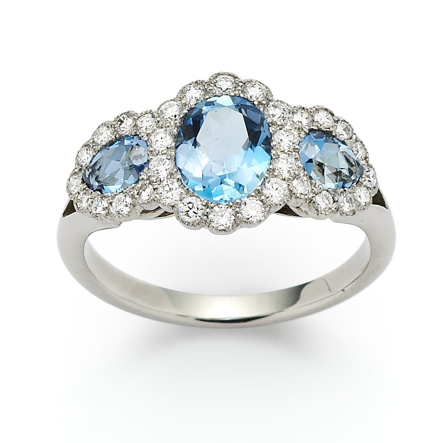 Medium aquamarine and diamond triple cluster engagement ring