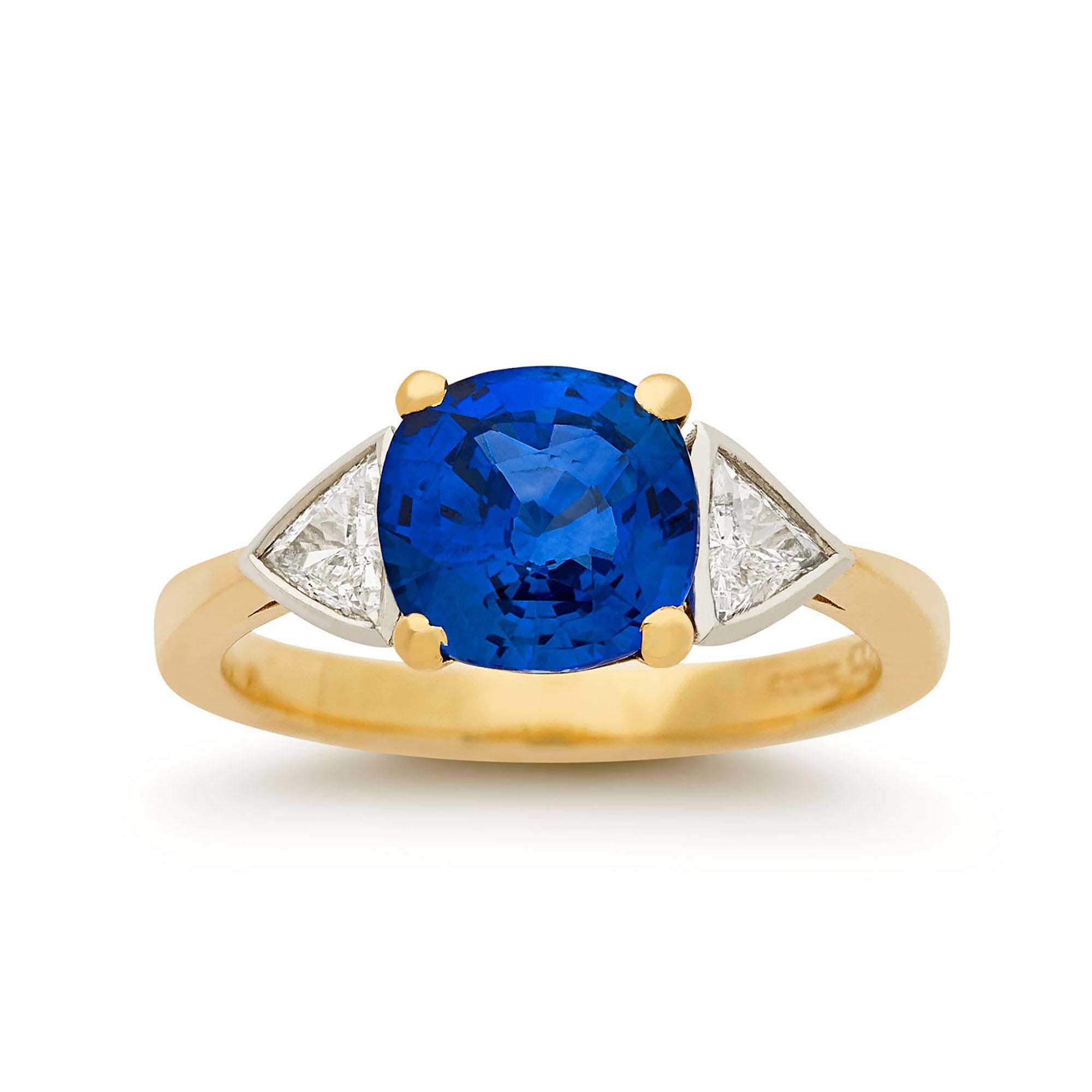 Ceylon sapphire and triangular diamond three stone ring
