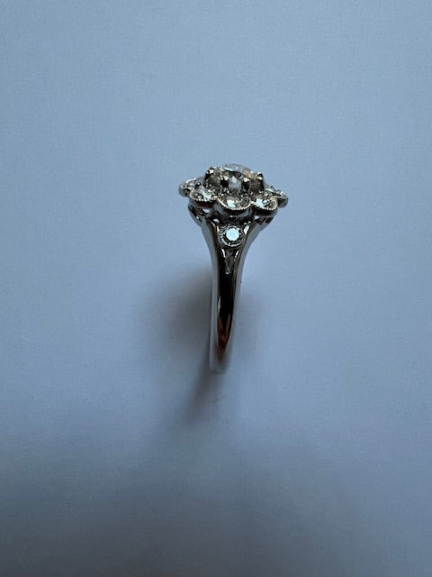 Brilliant cut diamond cluster ring