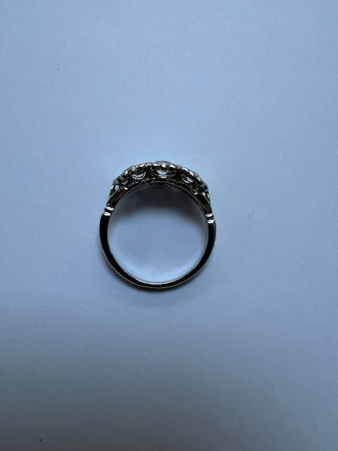 Brilliant cut diamond triple cluster engagement ring