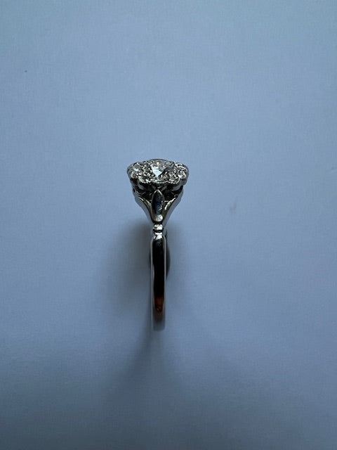 Brilliant cut diamond triple cluster engagement ring