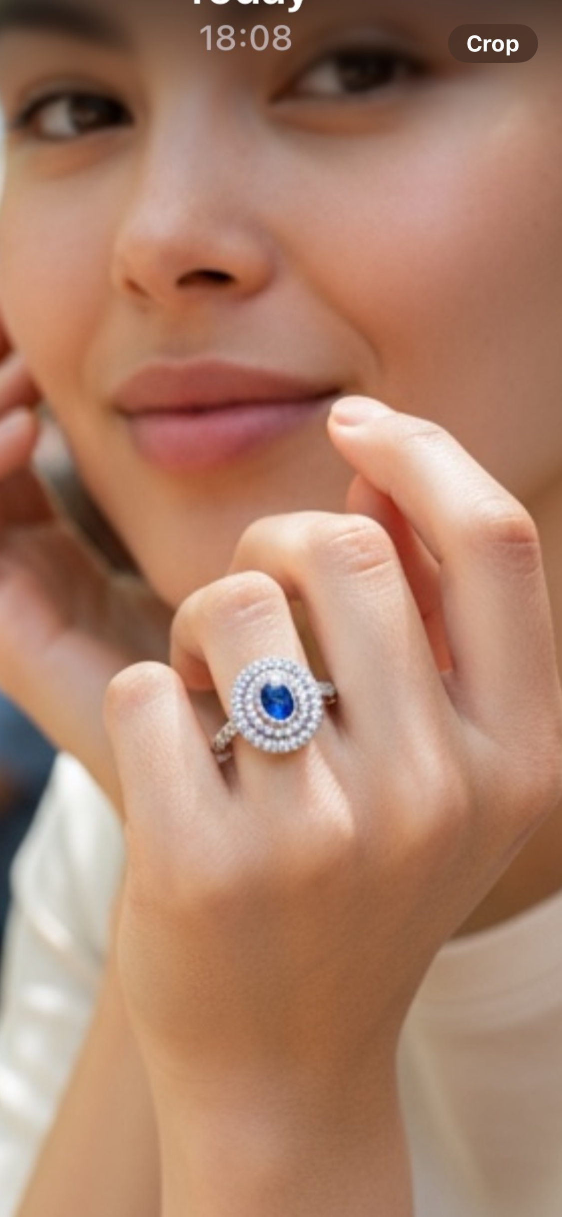Oval sapphire and diamond double cluster ring
