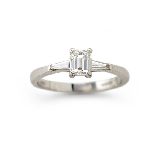 Emerald cut and tapered baguette cut diamond ring