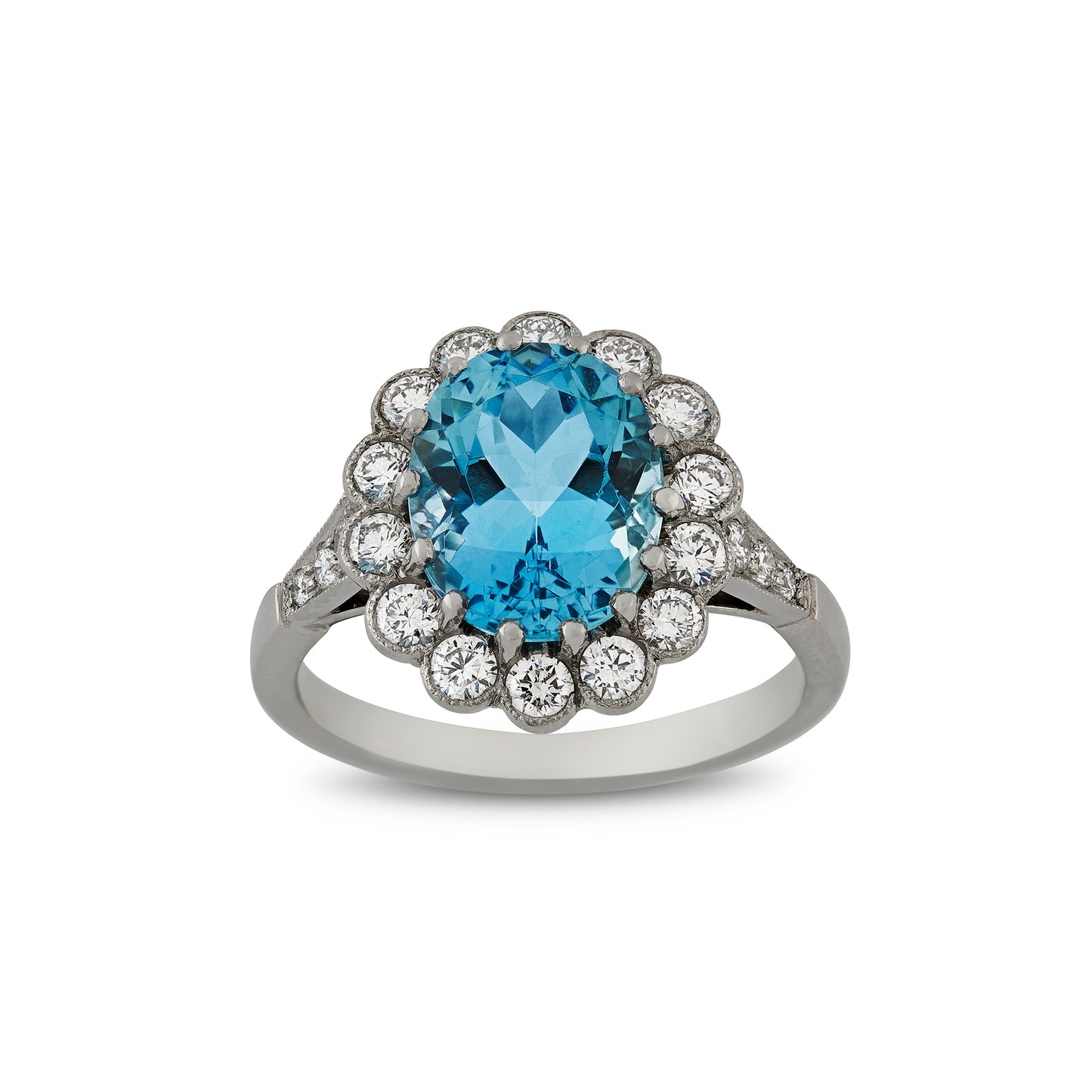 Oval aquamarine and diamond cluster engagement ring