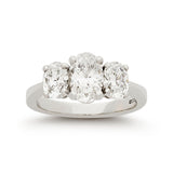 Oval diamond three stone engagement ring