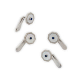 Set of four 18ct white gold, cabochon sapphire and mother of pearl dress studs