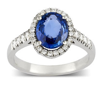 Sapphire and diamond cluster engagement ring